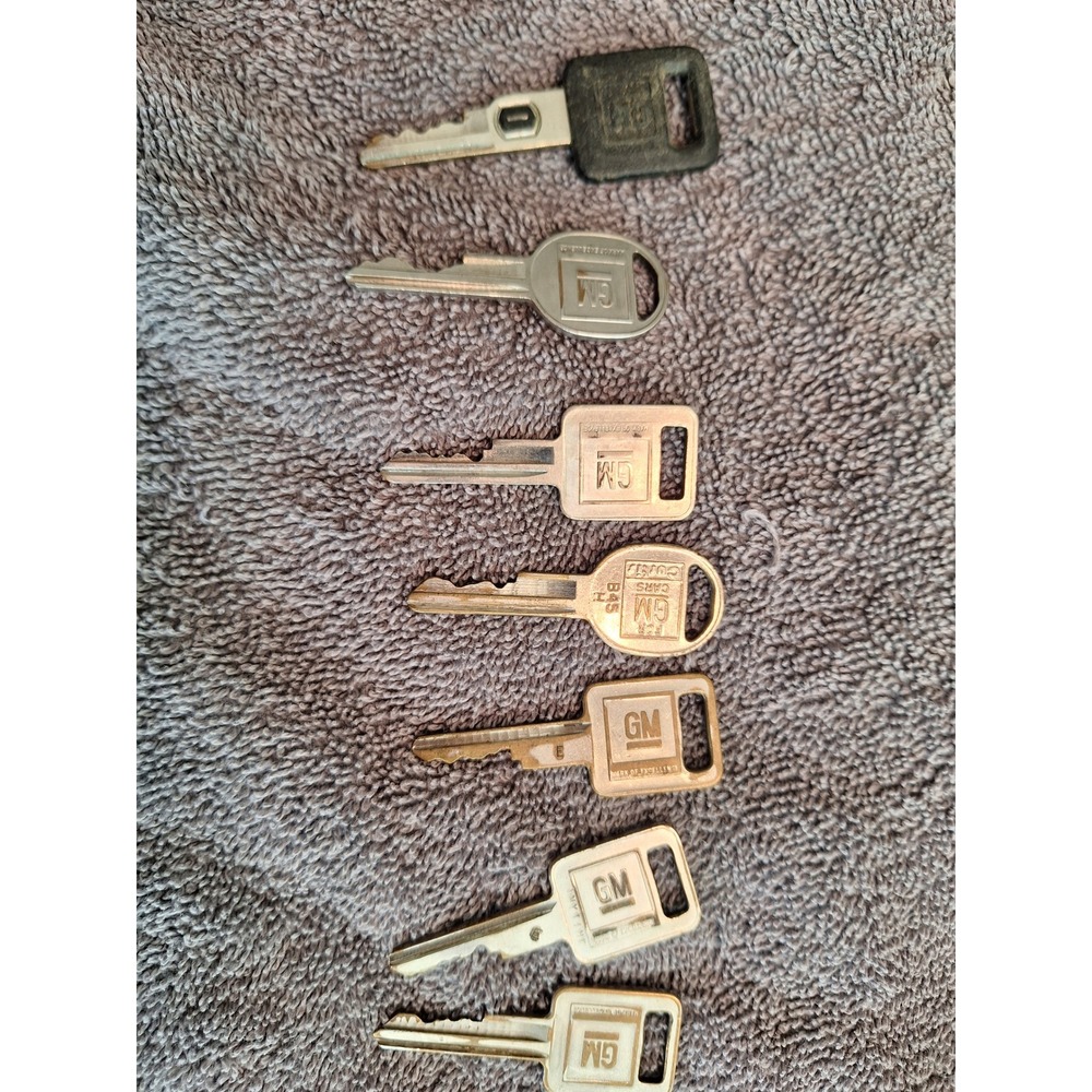 Vintage GM Car Keys Lot of 7 General Motors Chevrolet Pontiac Buick Oldsmobile